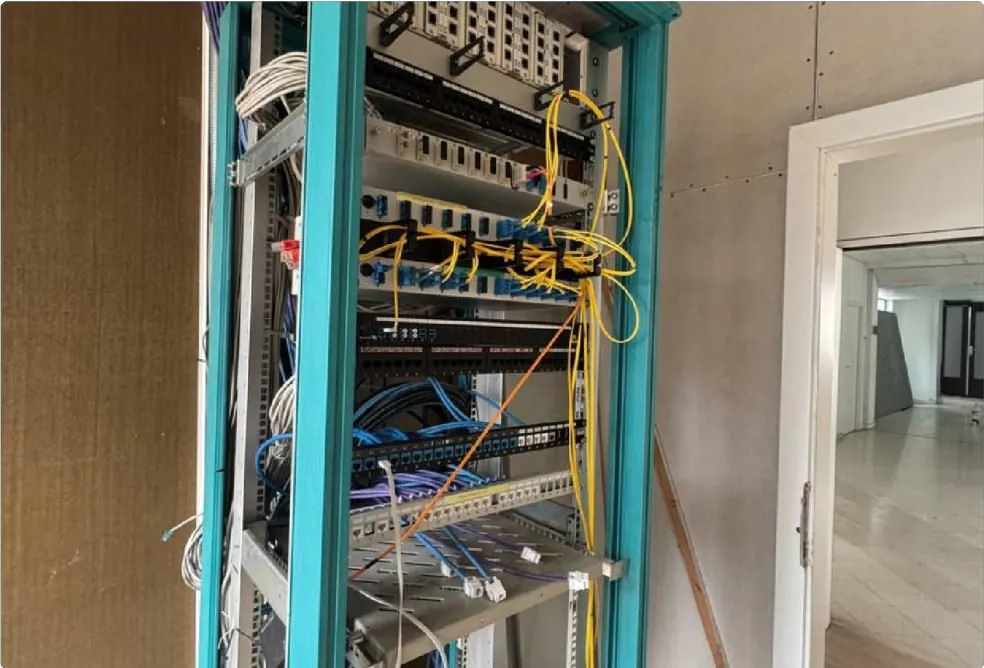 Production Hub IT rack and optical infrastructure