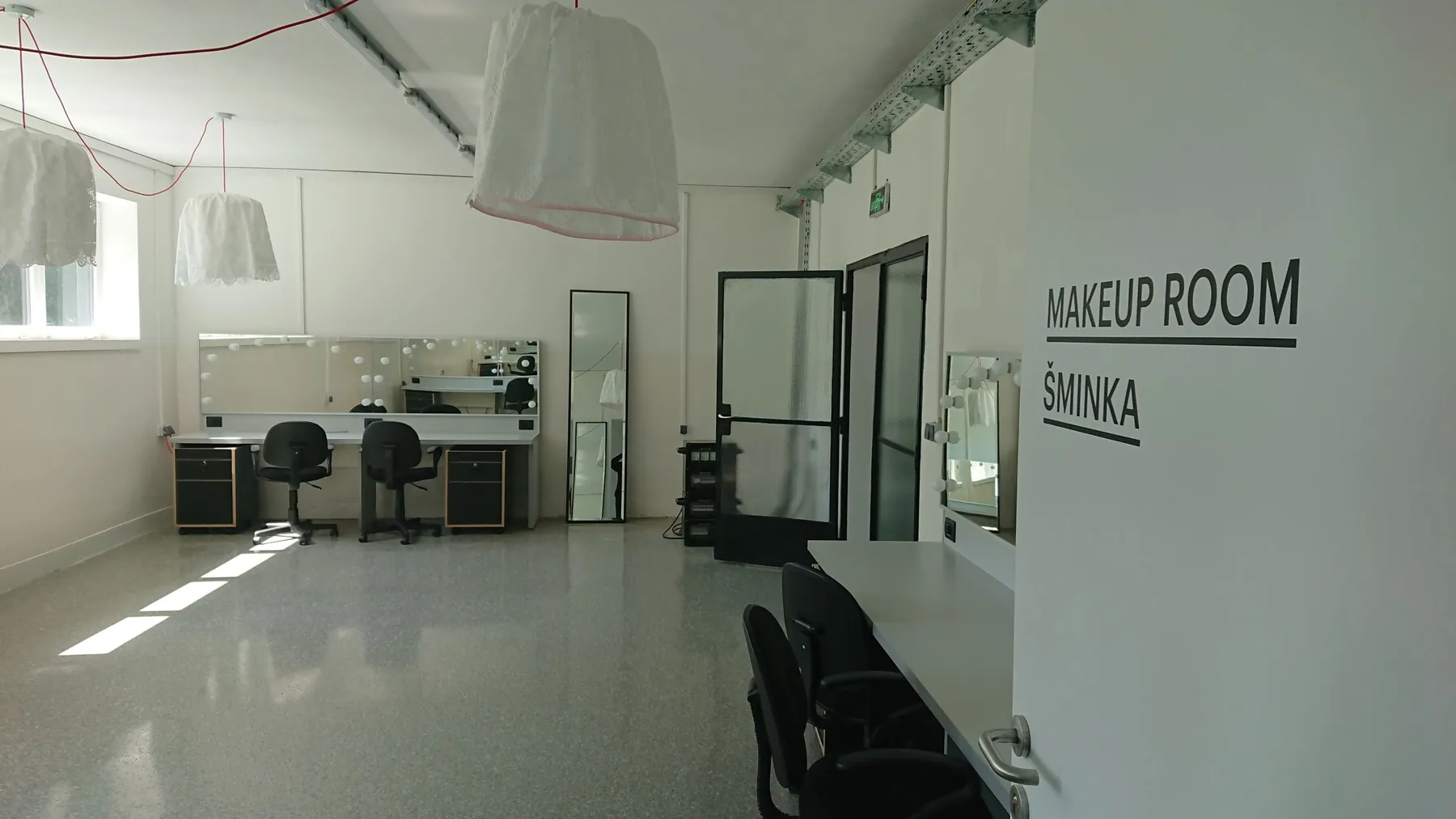 Studio 1 makeup room with mirrors and preparation area