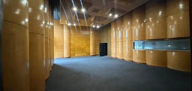 Studio 3 warm wood-paneled interior